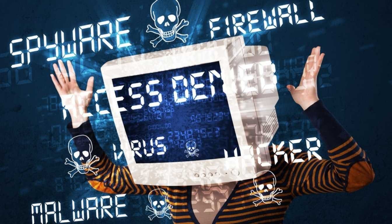 Hacker type signs with monitor head person